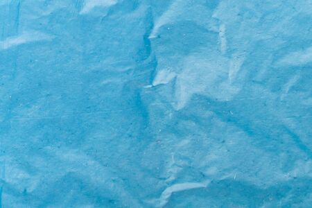 blue thin wrinkled foil texture.の写真素材