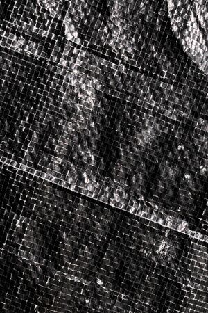 black and white plastic bag surface with blur effect..の写真素材