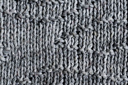 gray wool material texture or backgroundの写真素材