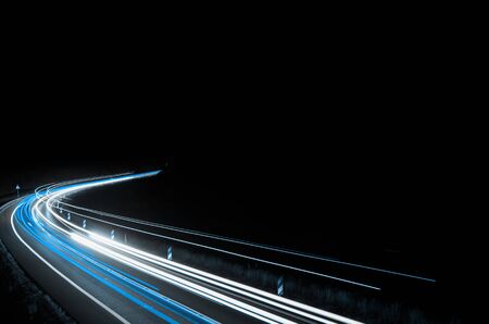 blue car lights at night. long exposureの写真素材