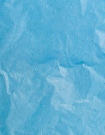 blue sheet of paper with visible textureの写真素材