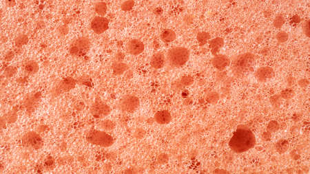 pink washing sponge. texture or backgroundの写真素材