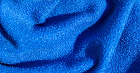 creased blue cotton fabric. background