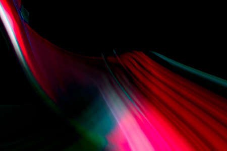 Abstract colorful lines on black backgroundの写真素材