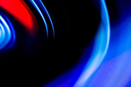 Abstract colorful lines on black background