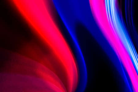 Abstract colorful lines on black backgroundの写真素材