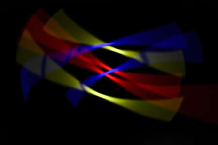 Abstract colorful lines on black backgroundの写真素材