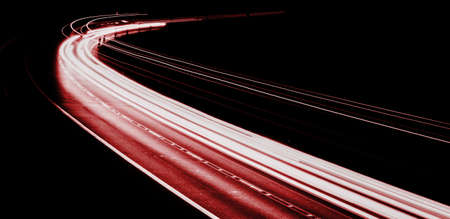 Abstract red car lights at nightの写真素材