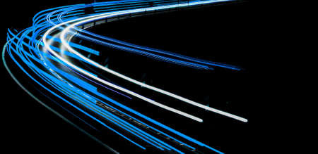 abstract blue car lights at nightの写真素材