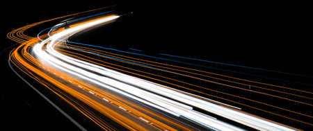 orange car lights at night. long exposureの写真素材