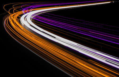 orange car lights at night. long exposureの写真素材