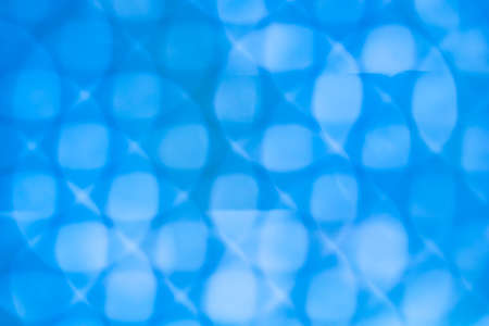abstract overlapping circles on a blue backgroundの写真素材