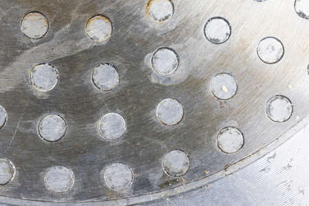 steel silver plate with spikes. background or textura