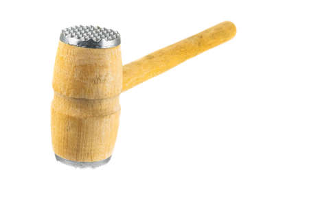 meat tenderizer on a white background. macro photo