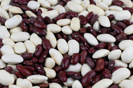 mixed white and red beans. background or textureの写真素材