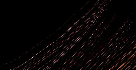 red dotted lines of lights on a black backgroundの写真素材