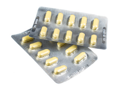 Blister pack with pills on white backgroundの写真素材