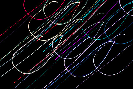 colored lines on a black background.textura