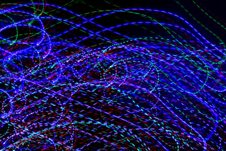 colored lines on a black background.texturaの写真素材