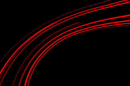 abstract red car lights at night. long exposureの写真素材