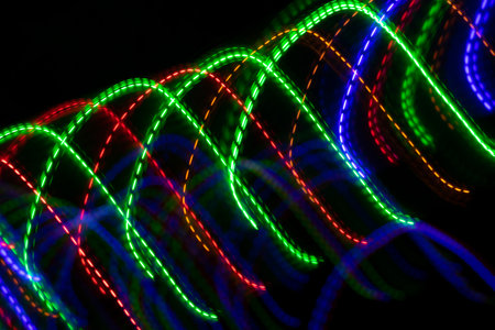 colored lines on a black background.texturaの写真素材