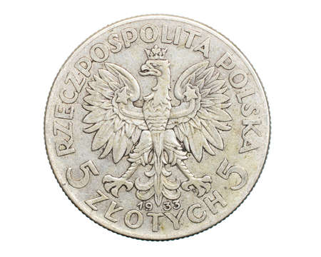 five Polish zloty coin on a white isolated backgroundの写真素材