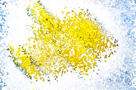 white sheet painted with blue and yellow paint in an interesting patternの写真素材