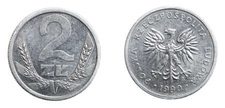 two Polish zloty coin on a white isolated backgroundの写真素材