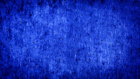 the board is painted blue with visible details. backgroundの写真素材