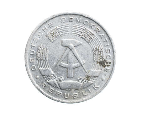 one german coin pfennig on a white isolated backgroundの写真素材