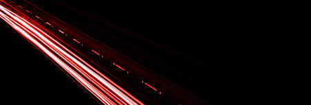 abstract red car lights at night. long exposureの写真素材