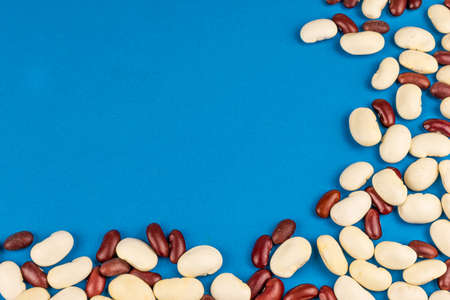 white and red beans on a blue backgroundの写真素材