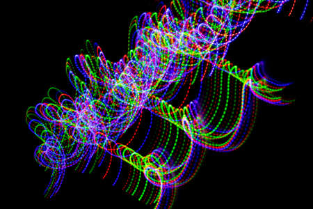 colored lines on a black background.texturaの写真素材