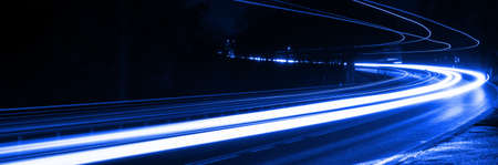 blue car lights at night. long exposureの写真素材