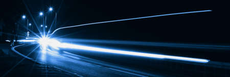 blue car lights at night. long exposureの写真素材