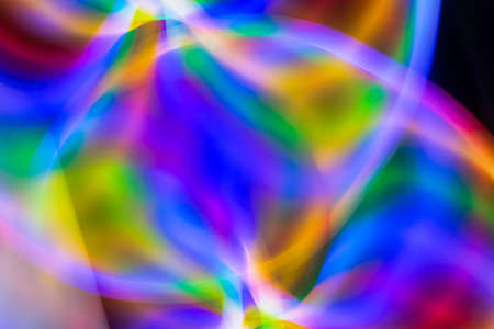 colored round lines on a black backgroundの写真素材