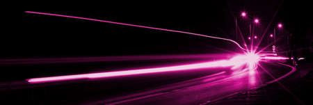 violet car lights at night. long exposureの写真素材