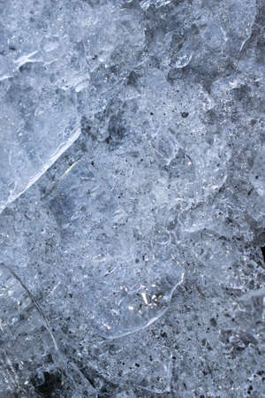interesting ice patterns on the ground. backgroundの写真素材