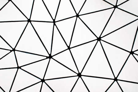 black lines in the shape of triangles on a white backgroundの写真素材