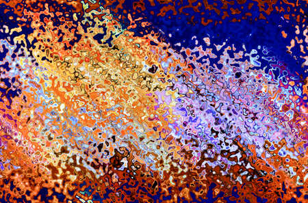 a black card painted with colorful paints in an interesting patternの写真素材