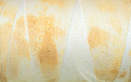 yellowed white threads with visible details. background or texturaの写真素材
