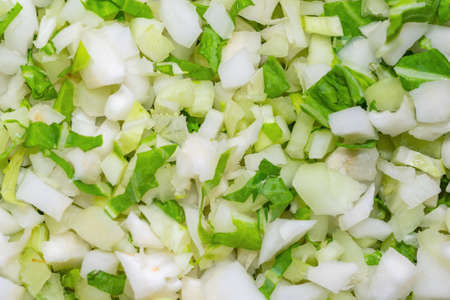 chopped cabbage into small cubes. background or textureの写真素材