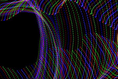 colored lines on a black background.texturaの写真素材