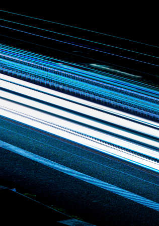 blue car lights at night. long exposureの写真素材