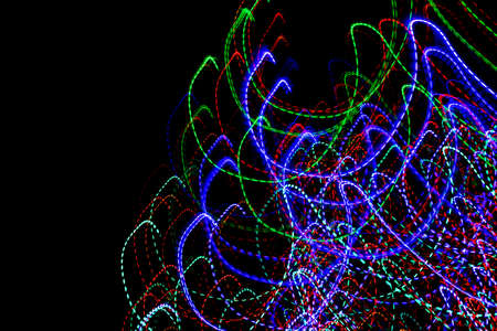 colored lines on a black background.texturaの写真素材
