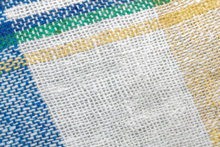 yellow and purple cotton fabric with visible details. texture or background