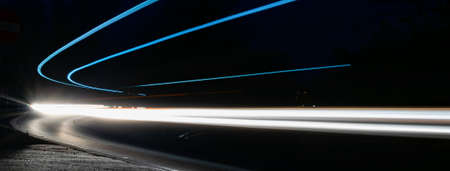 blue car lights at night. long exposureの写真素材
