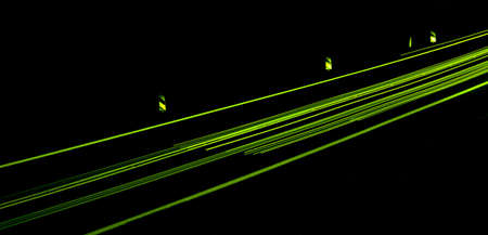 green car lights at night. long exposureの写真素材