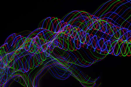 colored lines on a black background.textura