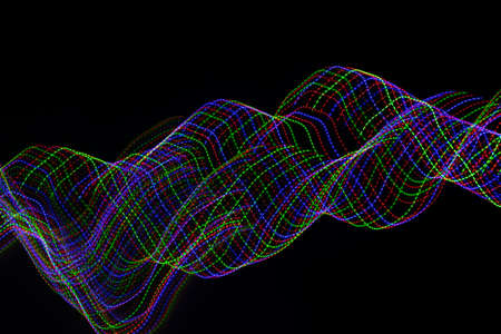 colored lines on a black background. texturaの写真素材